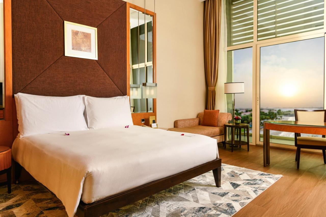 Deluxe Gulf View Room King– daily shuttle bus to Yas attractions Yas Mall Grand Mosque,1416860427:JPEG