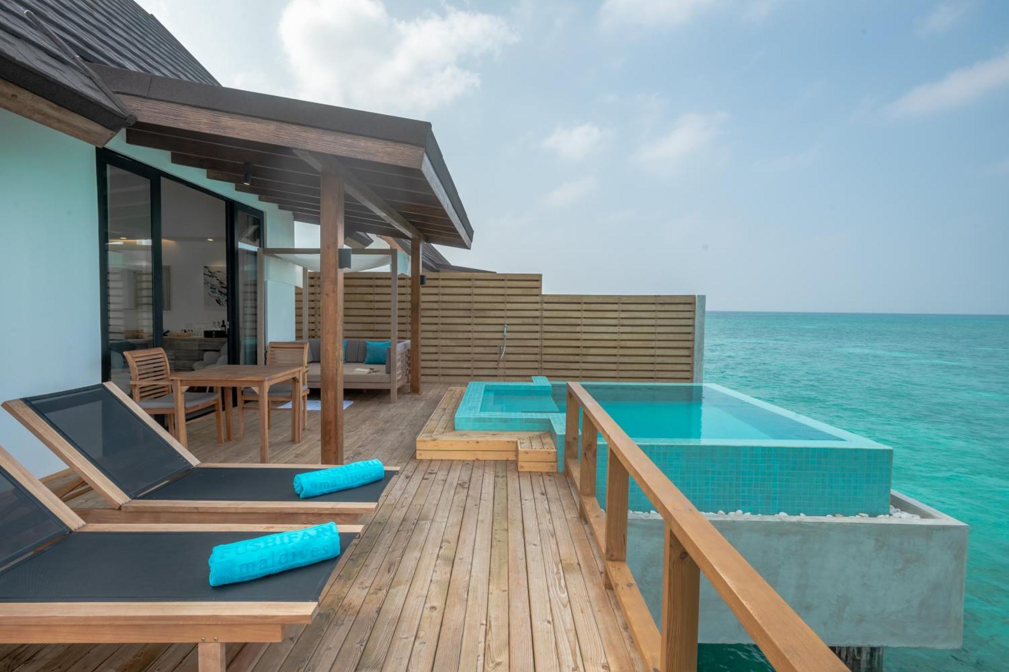 Water villa with private pool and Free access to sea plane lounge on Arrival