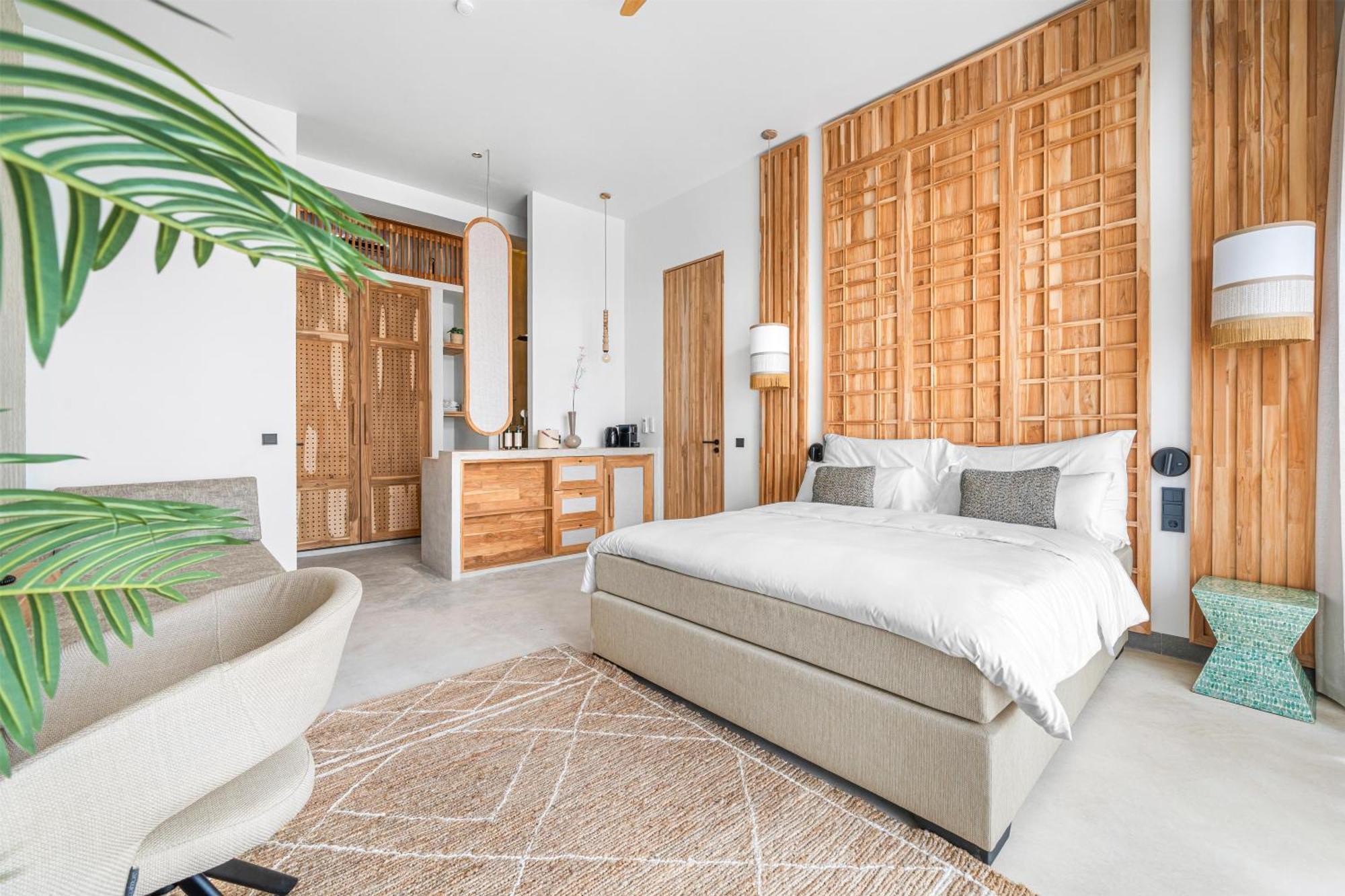 Deluxe kamer met kingsize bed en uitzicht op de lagune