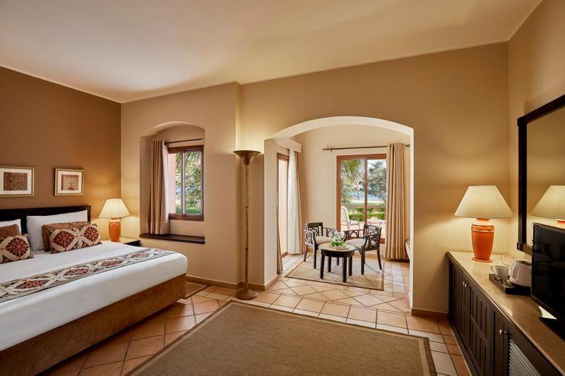 Deluxe Unterkunft mit Queensize- oder Einzelbett und Meerblick